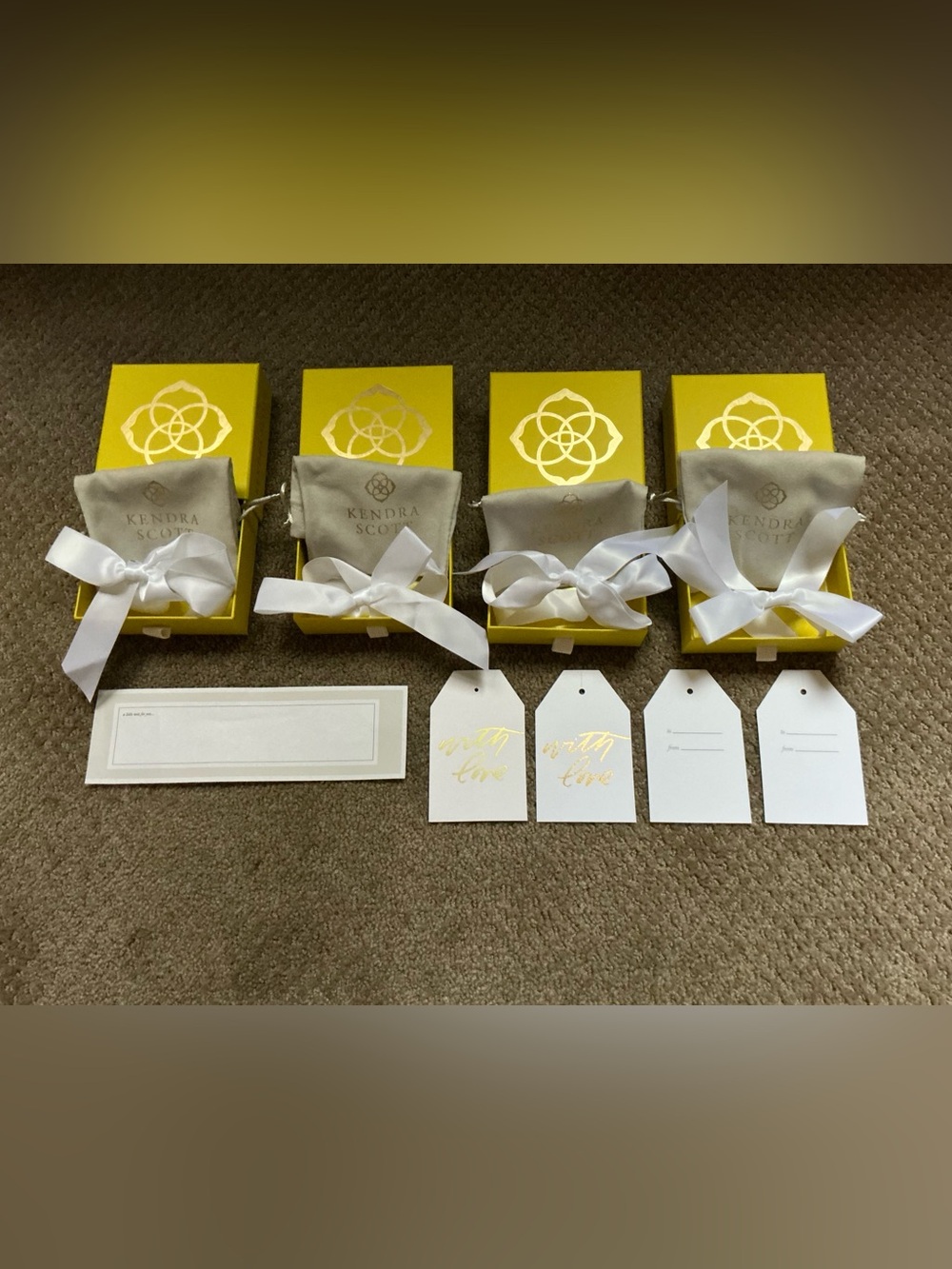 Kendra Scott Bright Yellow Gift Boxes with White Ribbons and Tags